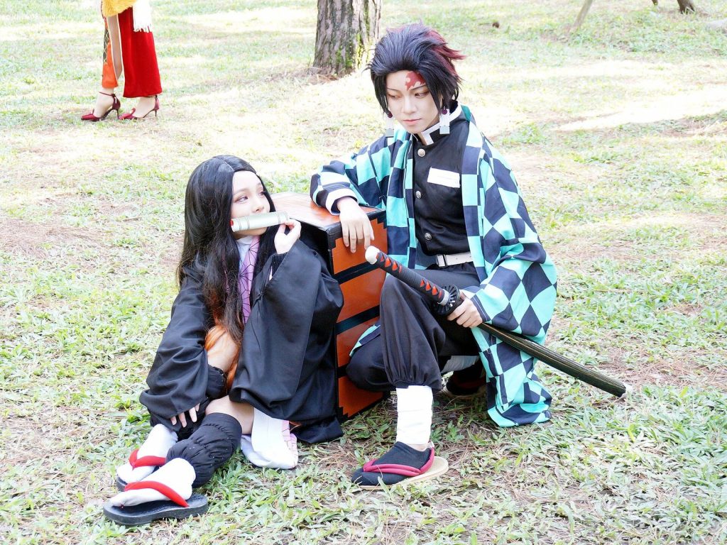 Cosplayers as Nezuko and Tanjiro Kamado from Demon Slayer at a Taiwan anime fair