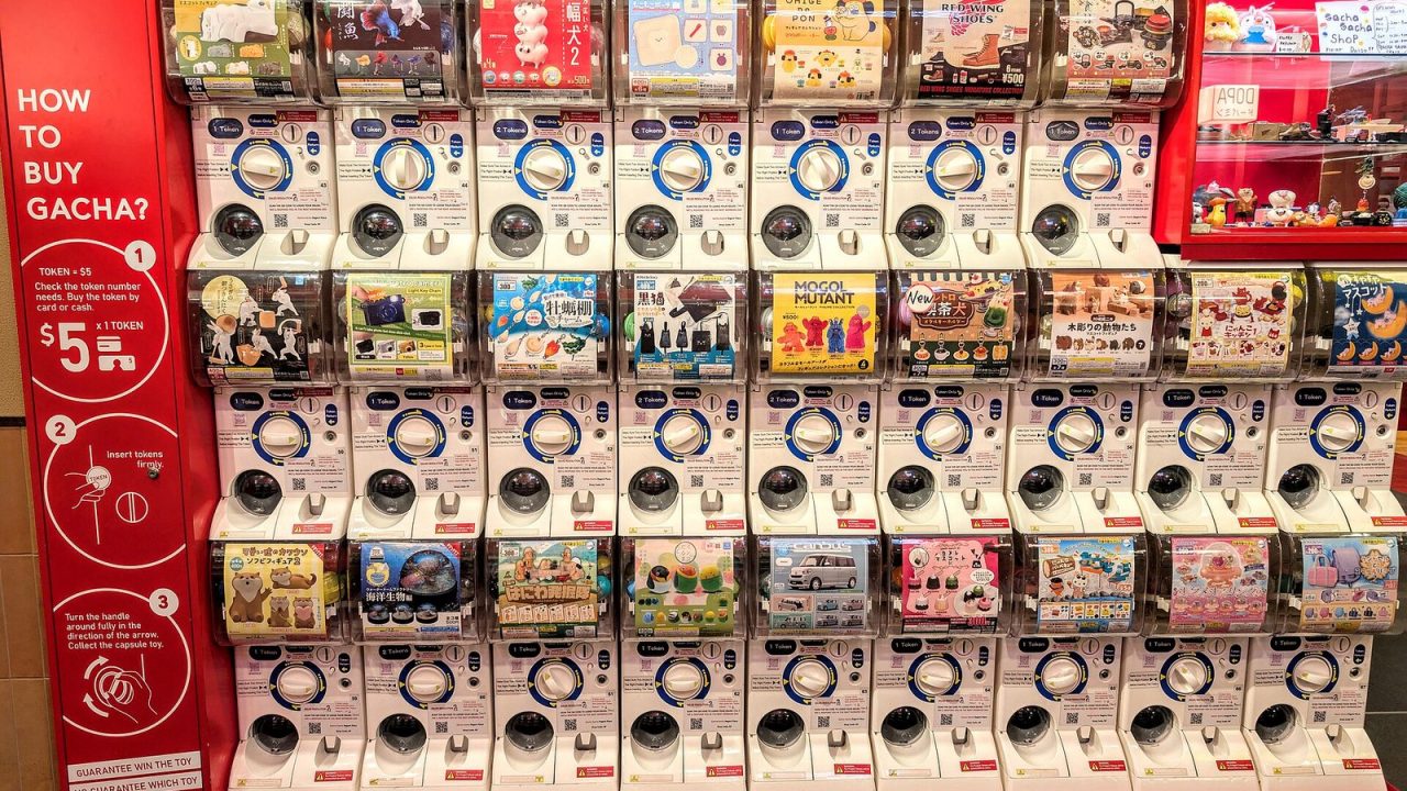 Wall of coin-operated gacha capsule machines at Regent Place in Sydney