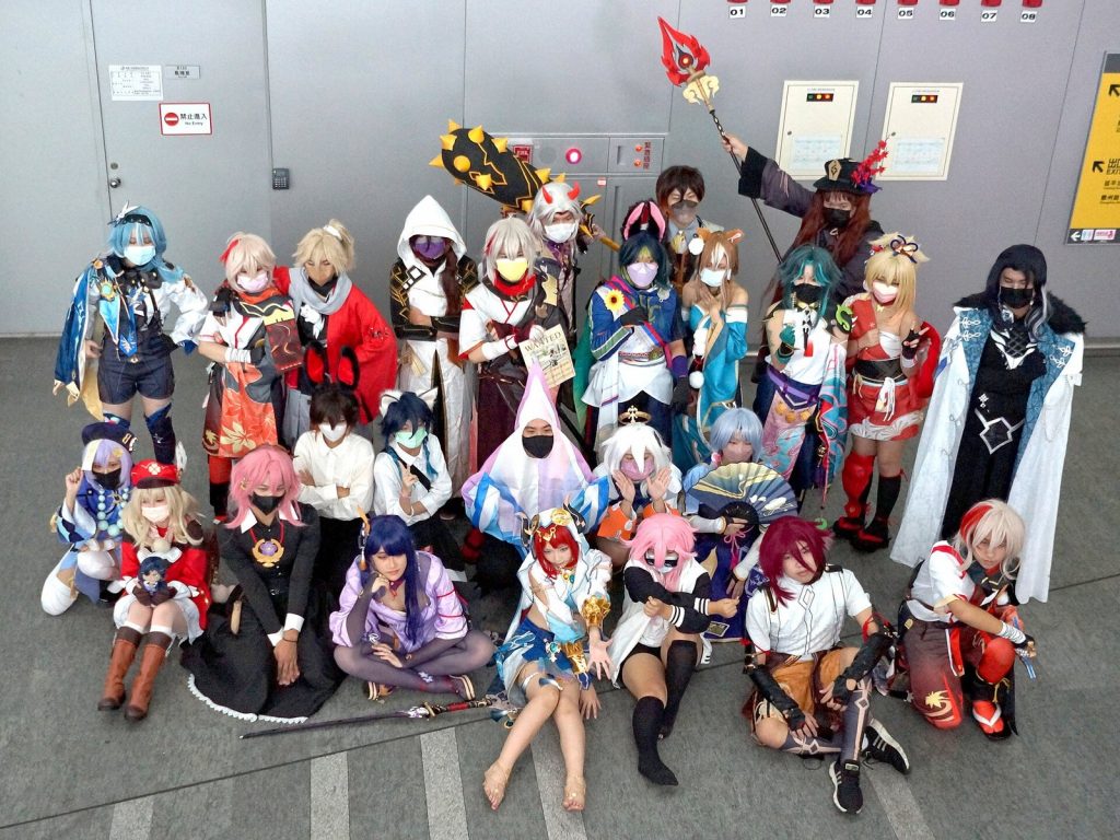 Group of Genshin Impact cosplayers, including Paimon, at a fan convention in Taipei